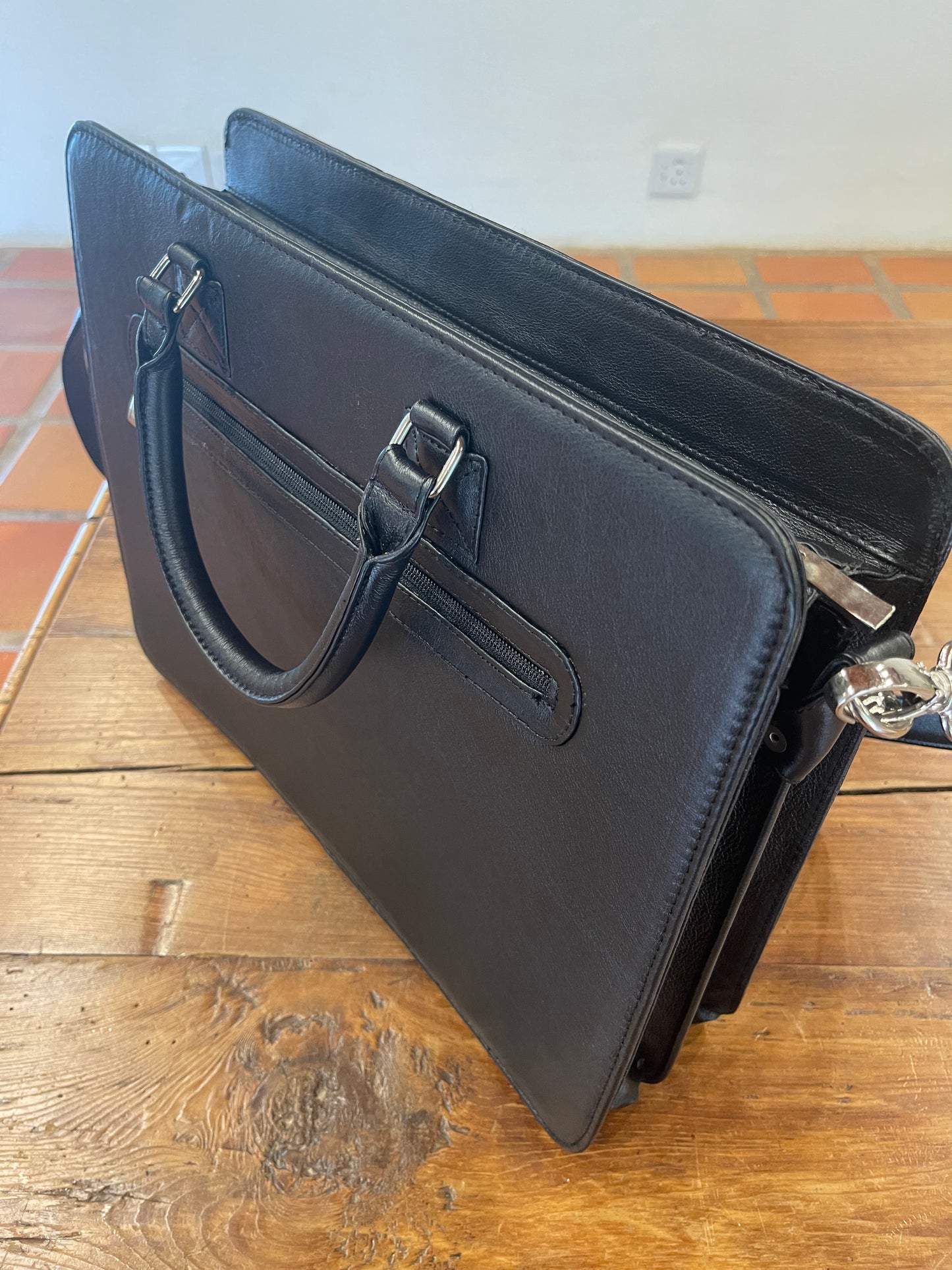 Rainmaker leather laptop bag (production time- 15 days)