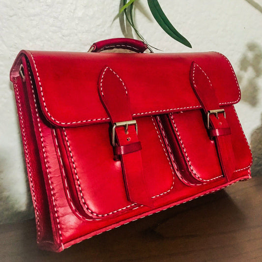 Genuine leather red laptop bag with two front pockets and buckles