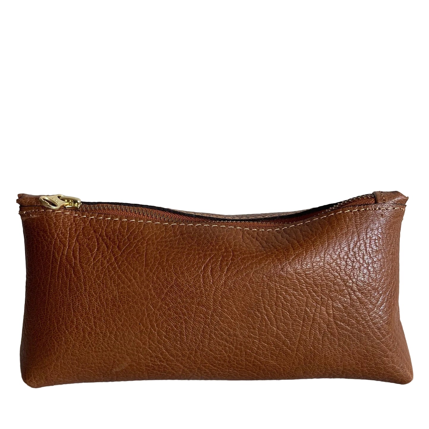 Brown leather pouch with a gold zipper on a textured white background