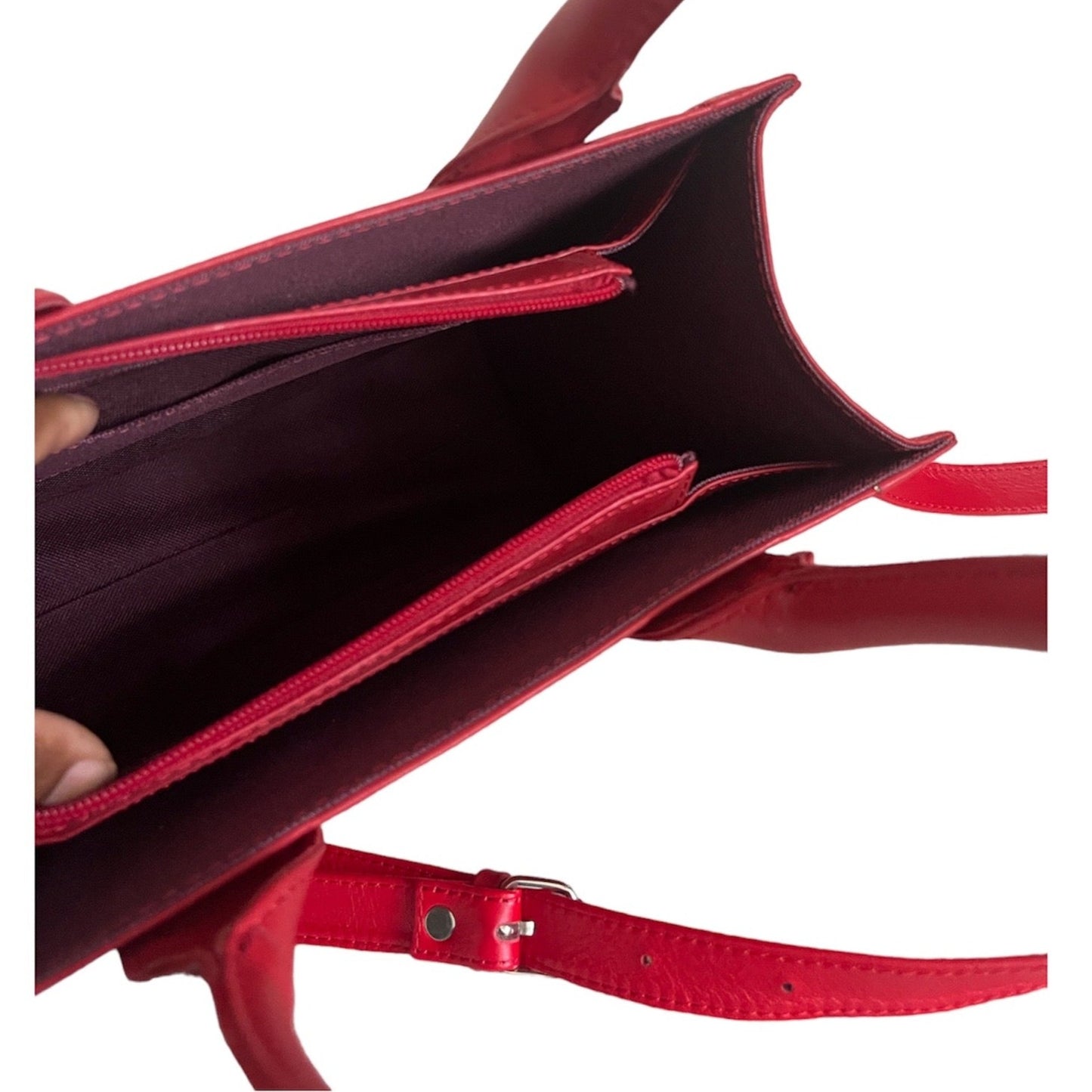 Geniune leather red bag top zip area