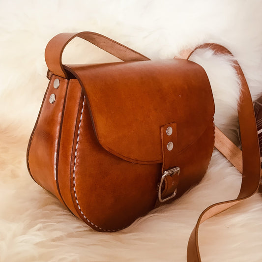 Genuine leather saddle stitched brown sling bag by NaniTa