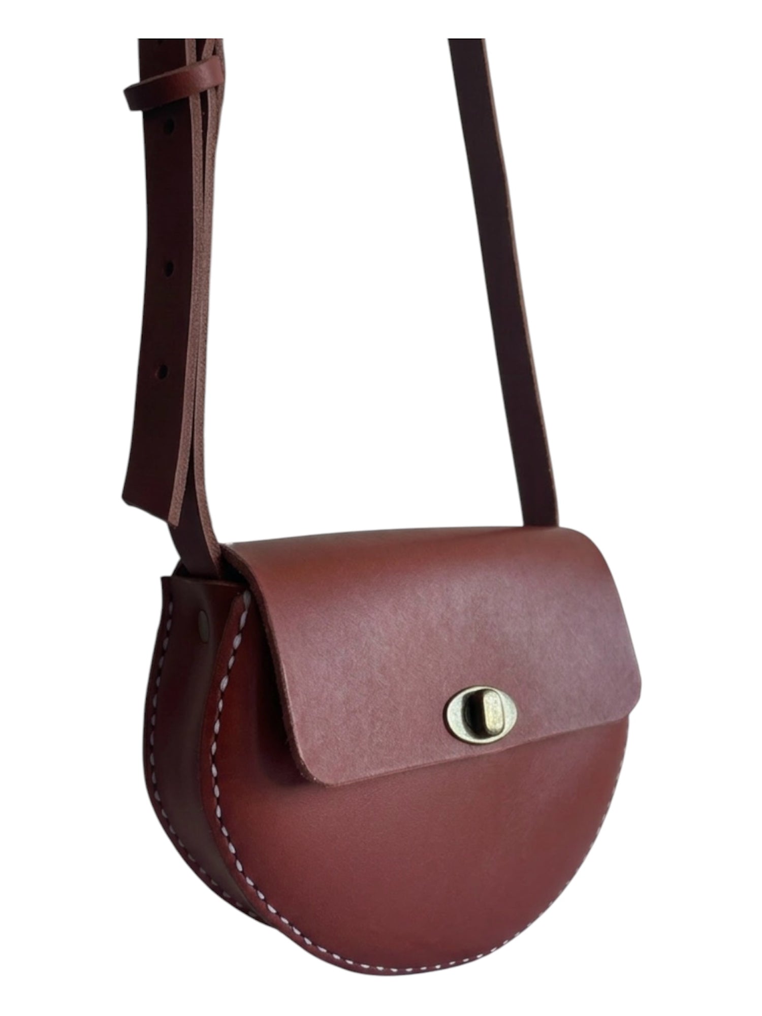 Brown leather crossbody bag on a white background