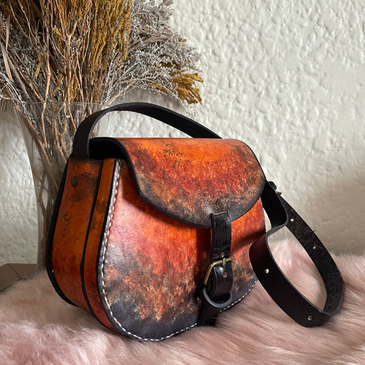 orange and black genuine leather sling bag